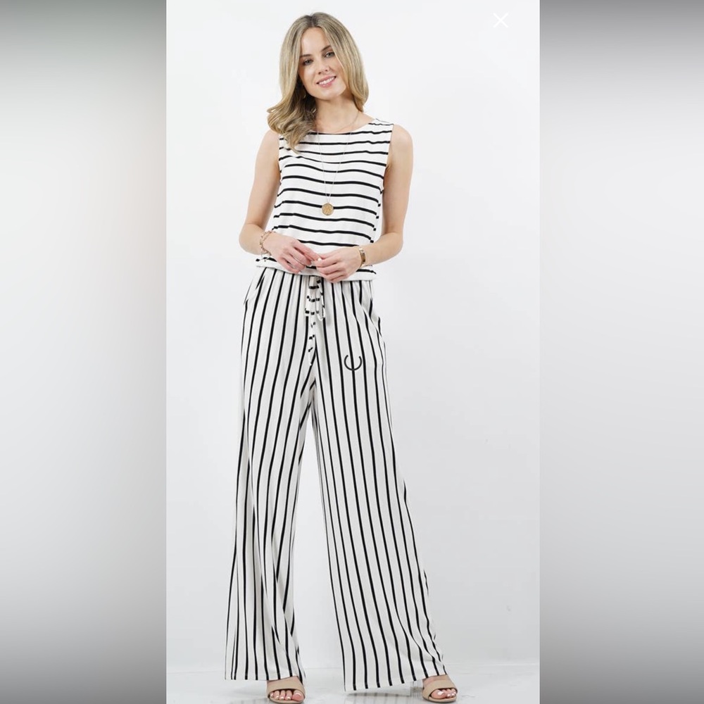 Womens jumpsuit white and black and black and white.